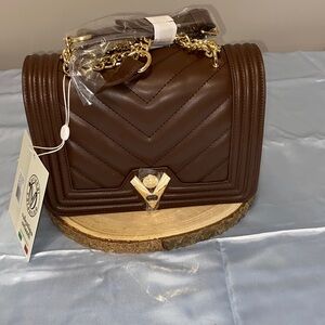 Brown Quilted Chain Shoulder Bag  It is not the original.